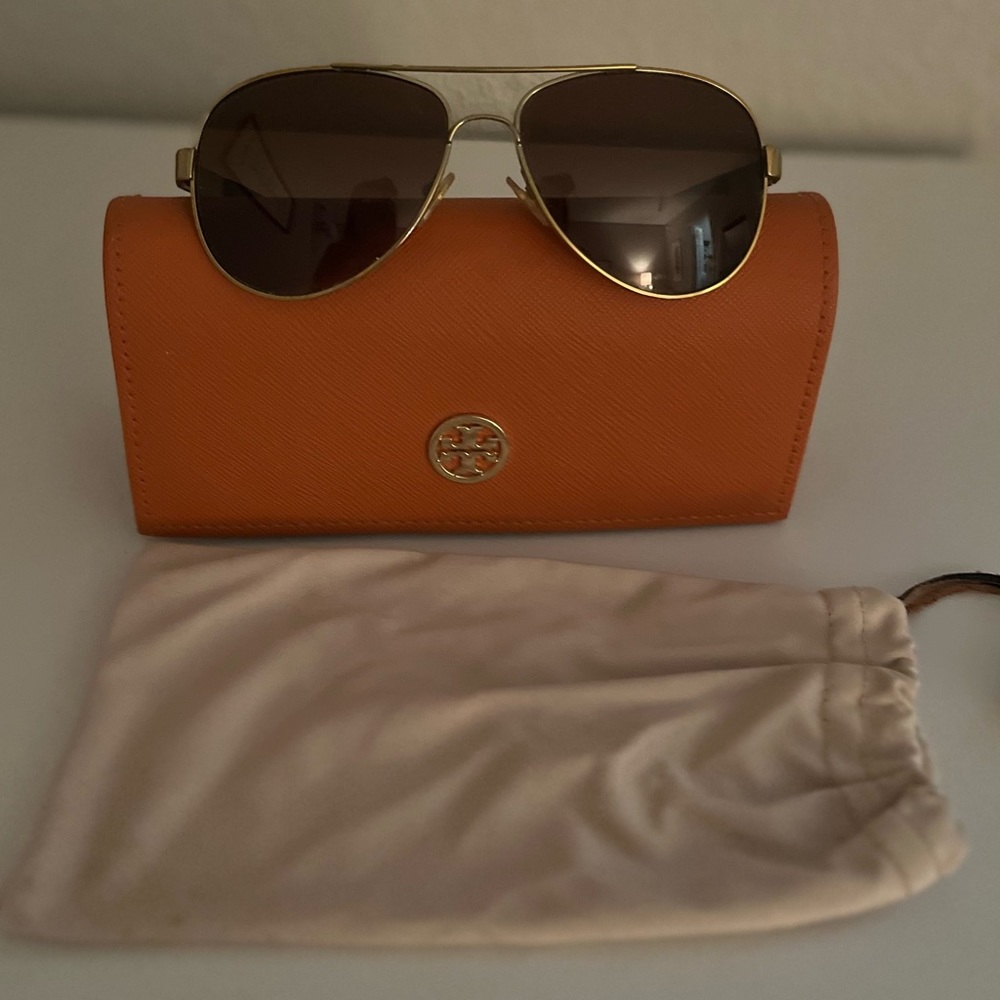 Tory Burch gold and brown sun glasses